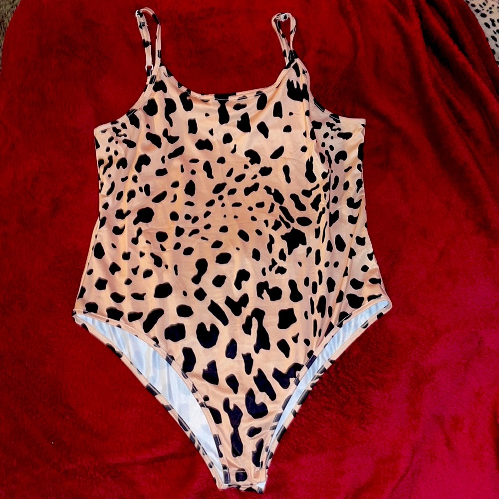NEVER WORN body suit in cheetah